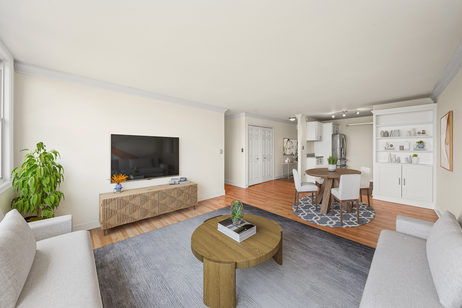 5975 North Odell Avenue, Unit 5C Chicago, IL 60631 - Photo 3 of 20 a living room with furniture and a flat screen tv