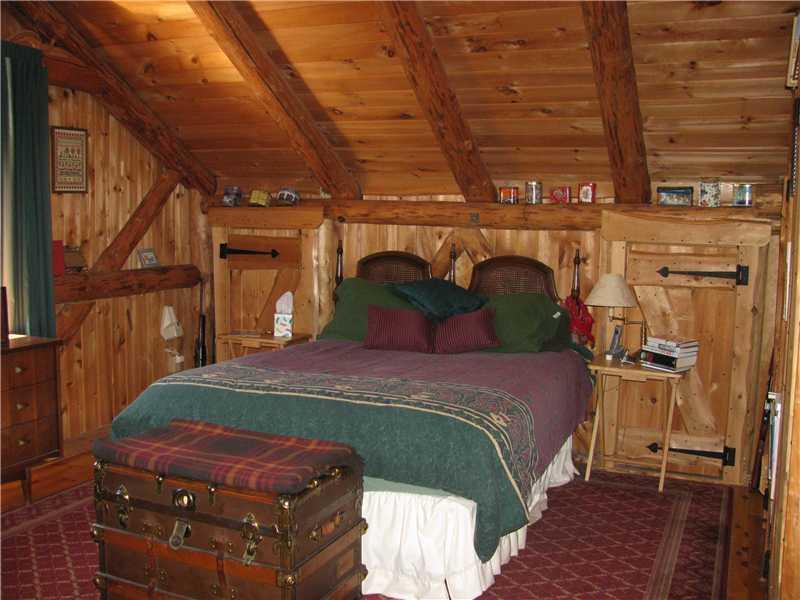 23 Trapper's Point Road Lakeville, ME 04487 - Photo 15 of 35 Bedroom. The bedroom offers more...