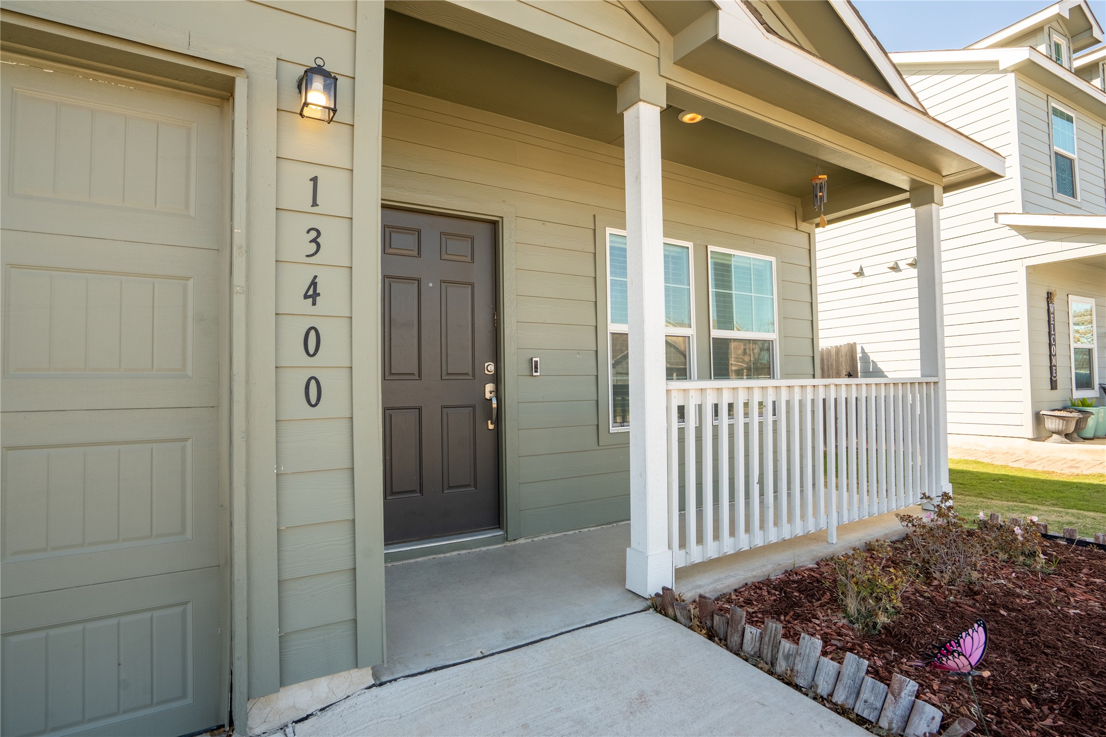 13400 Banquete Street Elgin, TX 78621 - Photo 4 of 29 Doorway to property with a porch