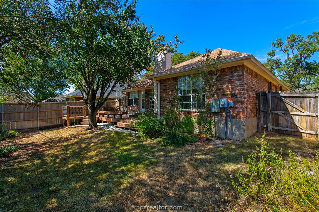 2817 Brandywine Circle Bryan, TX 77807 - Photo 28 of 28 a view of a house with a small yard and potted plants