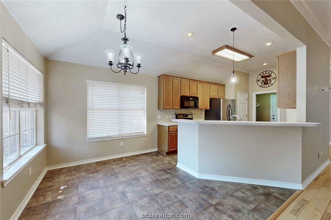 2817 Brandywine Circle Bryan, TX 77807 - Photo 9 of 28 a view of a kitchen with furniture and windows
