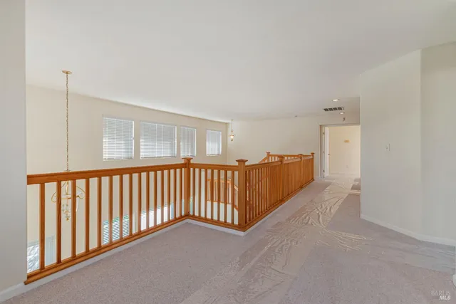 a view of a hallway with entryway