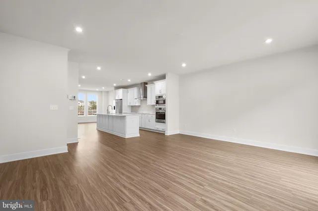 a bathroom with a toilet a sink and a mirror
