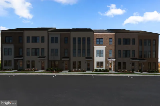 a front view of a building with a street