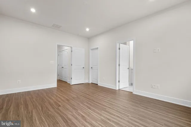 a bathroom with a double vanity sink mirror and