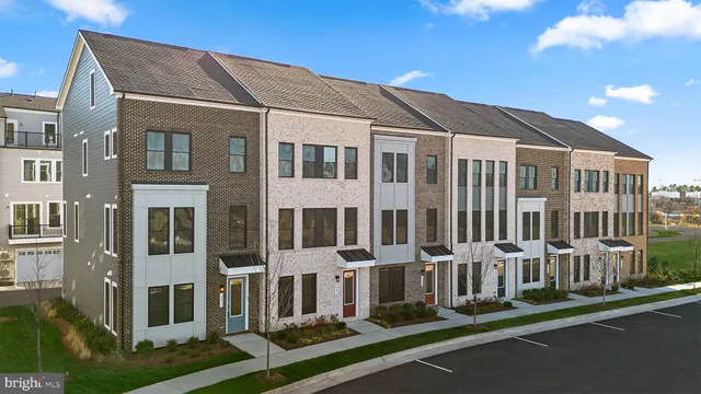 a view of a white building among the street