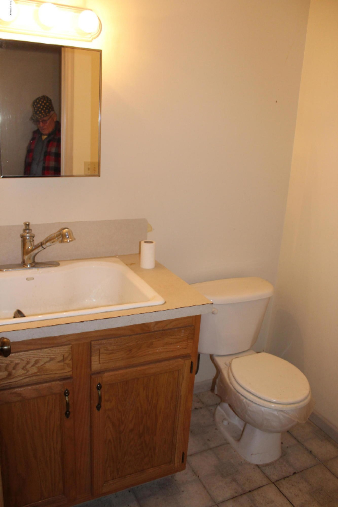 7011 West County Farm Road Greenville, MI 48838 - Photo 52 of 59 Outbuilding bathroom near office area.