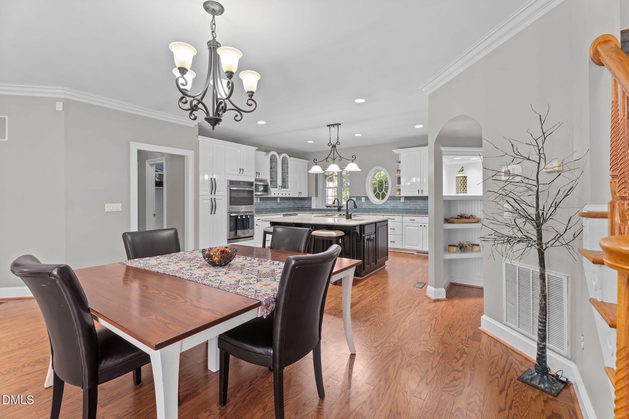 5870 Hoyt Road Middlesex, NC 27557 - Photo 11 of 33 a view of a dining room with furniture and wooden floor