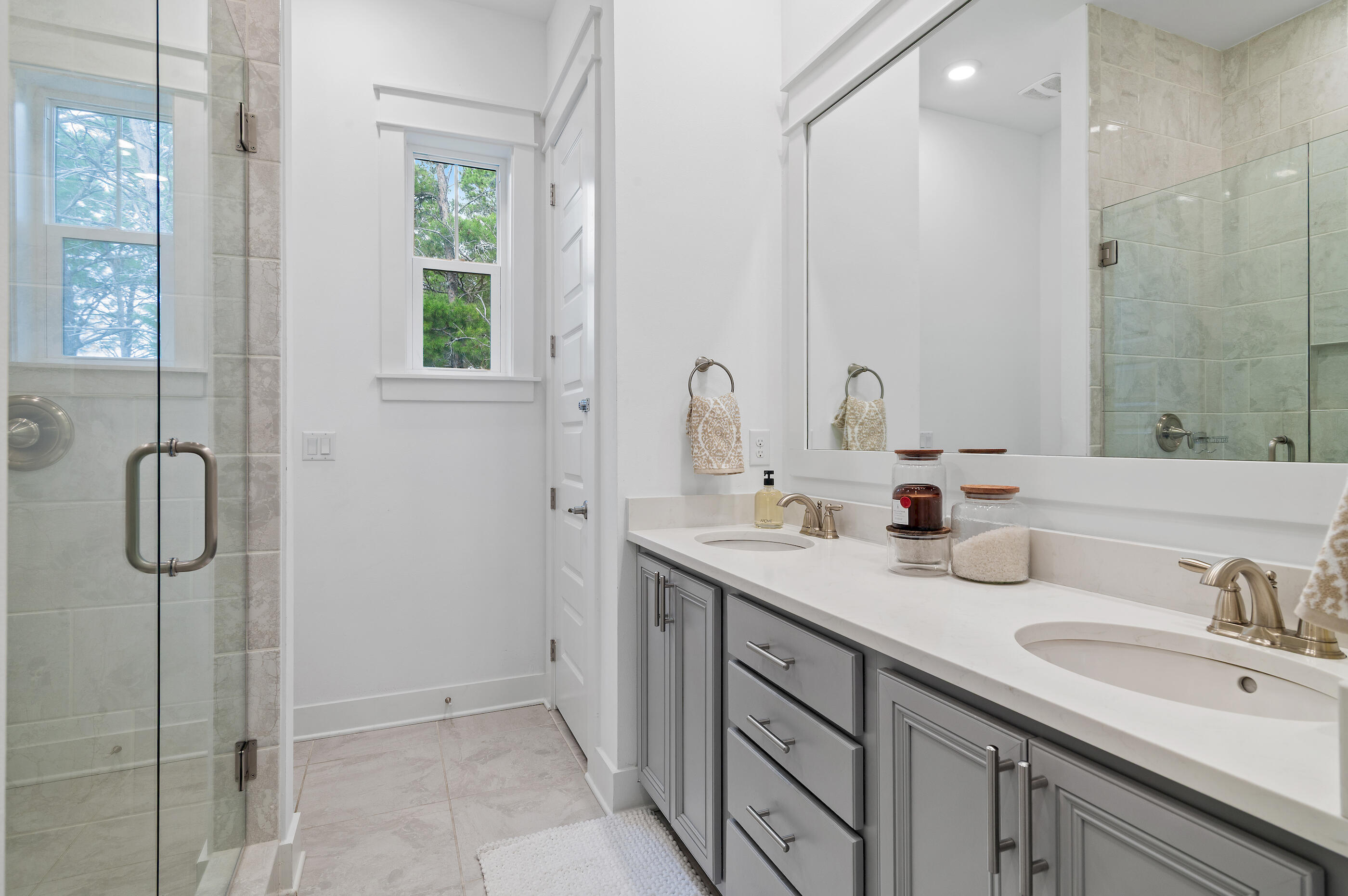 25 Pine Lands Loop East, Unit A Inlet Beach, FL 32461 - Photo 14 of 30 a bathroom with a granite countertop sink a toilet and a mirror