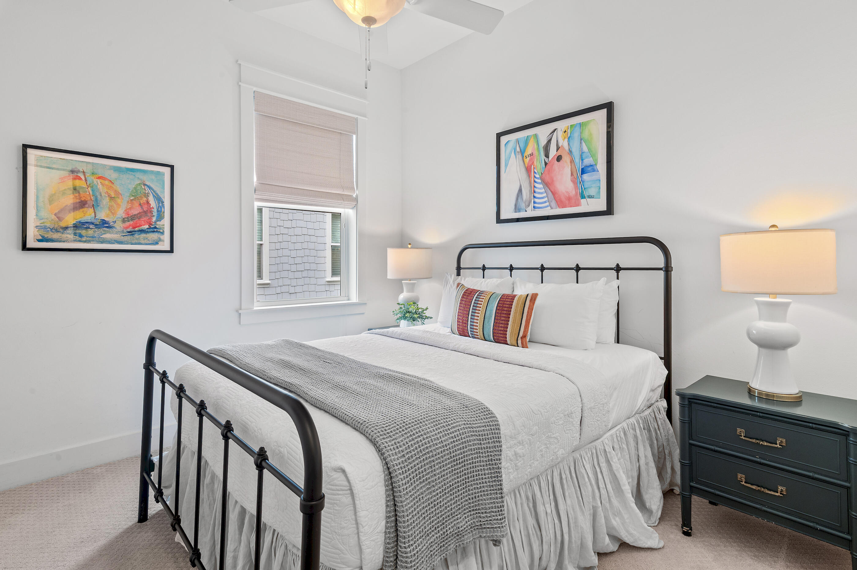 25 Pine Lands Loop East, Unit A Inlet Beach, FL 32461 - Photo 15 of 30 a bedroom with a bed and painting on the wall