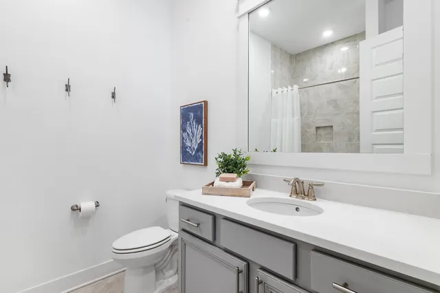 a bedroom with a bed and a tv