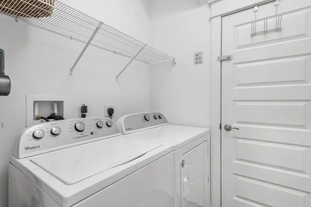 an aerial view of a house with a swimming pool