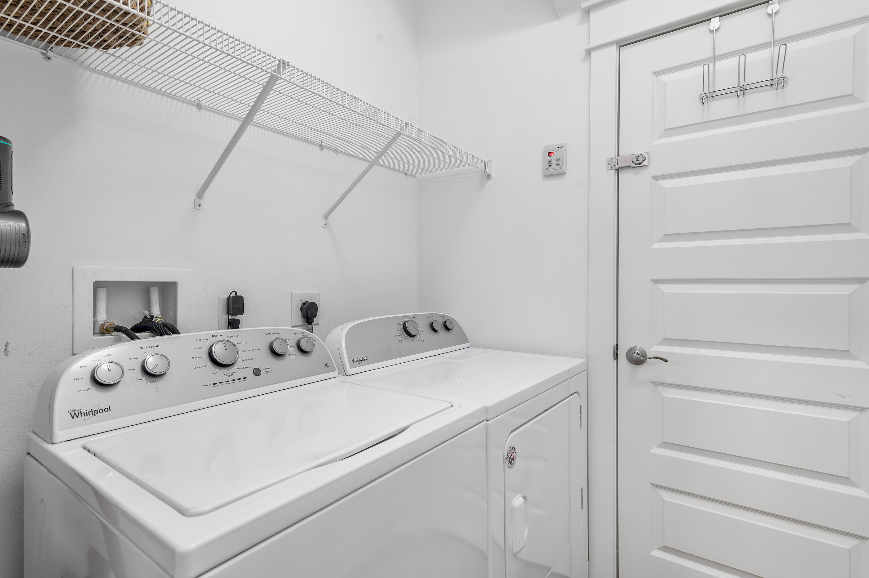 25 Pine Lands Loop East, Unit A Inlet Beach, FL 32461 - Photo 19 of 30 a utility room with dryer and washer