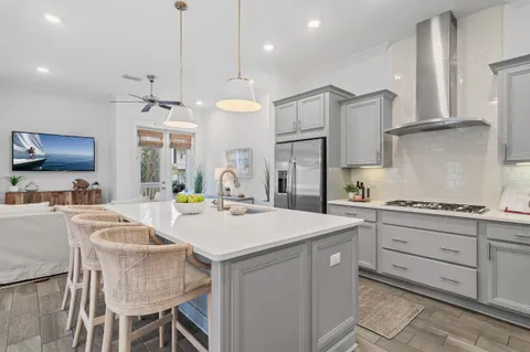 a view of a kitchen and a sink