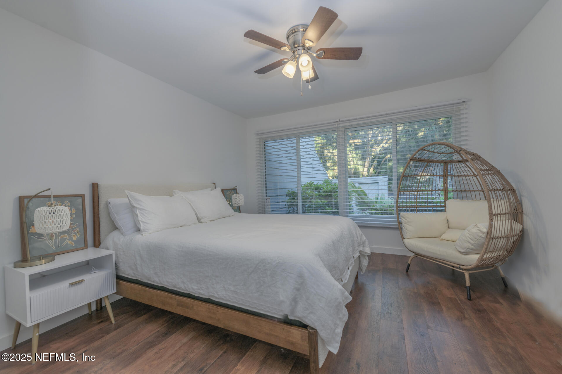 3426 Sea Marsh Road Fernandina Beach, FL 32034 - Photo 30 of 39 a bedroom with a bed and a large window