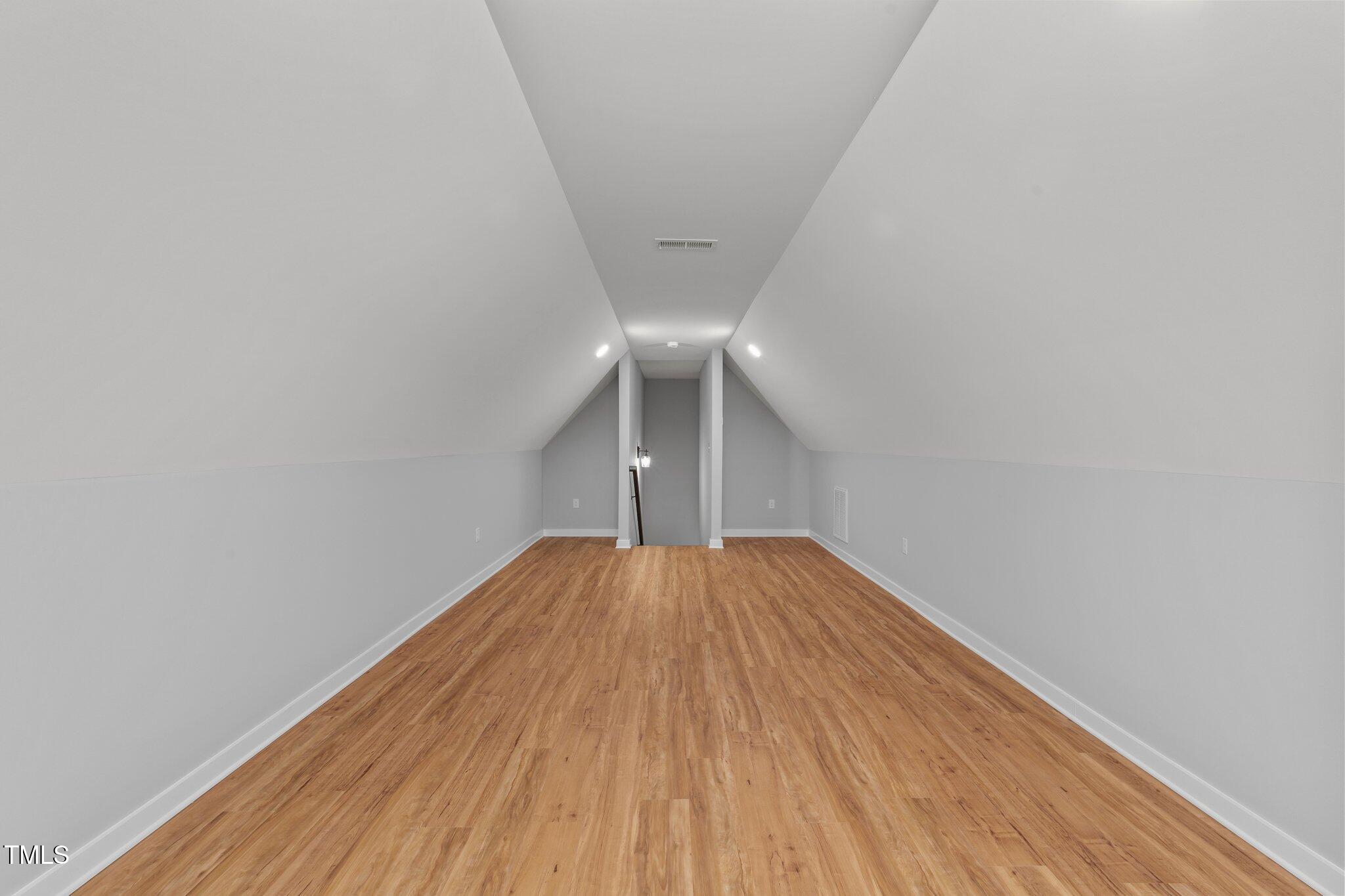 2955 Mt Pleasant Road Willow Spring, NC 27592 - Photo 31 of 44 a view of empty room with wooden floor