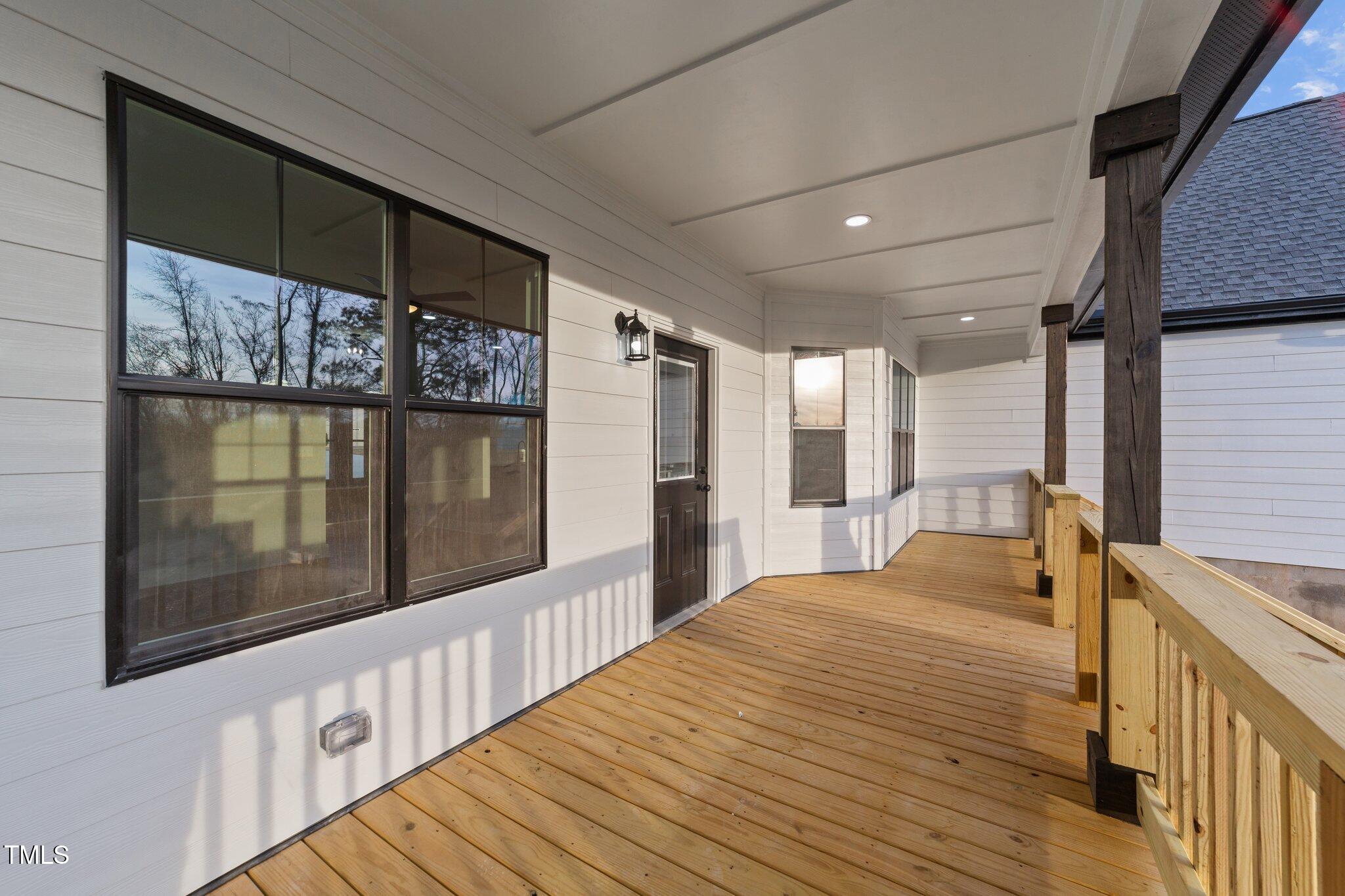 2955 Mt Pleasant Road Willow Spring, NC 27592 - Photo 32 of 44 a bedroom with a bed and window