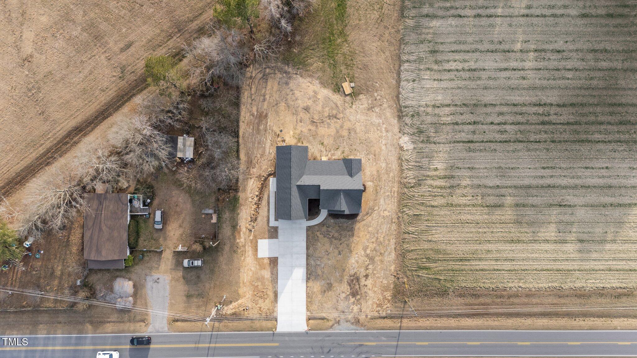 2955 Mt Pleasant Road Willow Spring, NC 27592 - Photo 34 of 44 a picture of a brick building