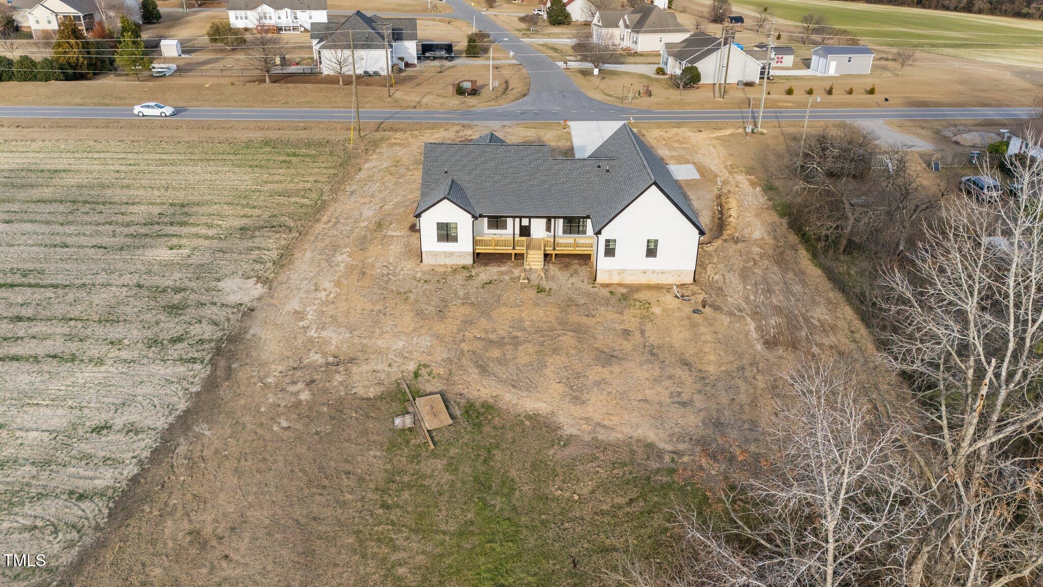 2955 Mt Pleasant Road Willow Spring, NC 27592 - Photo 38 of 44 a view of residential houses with outdoor space