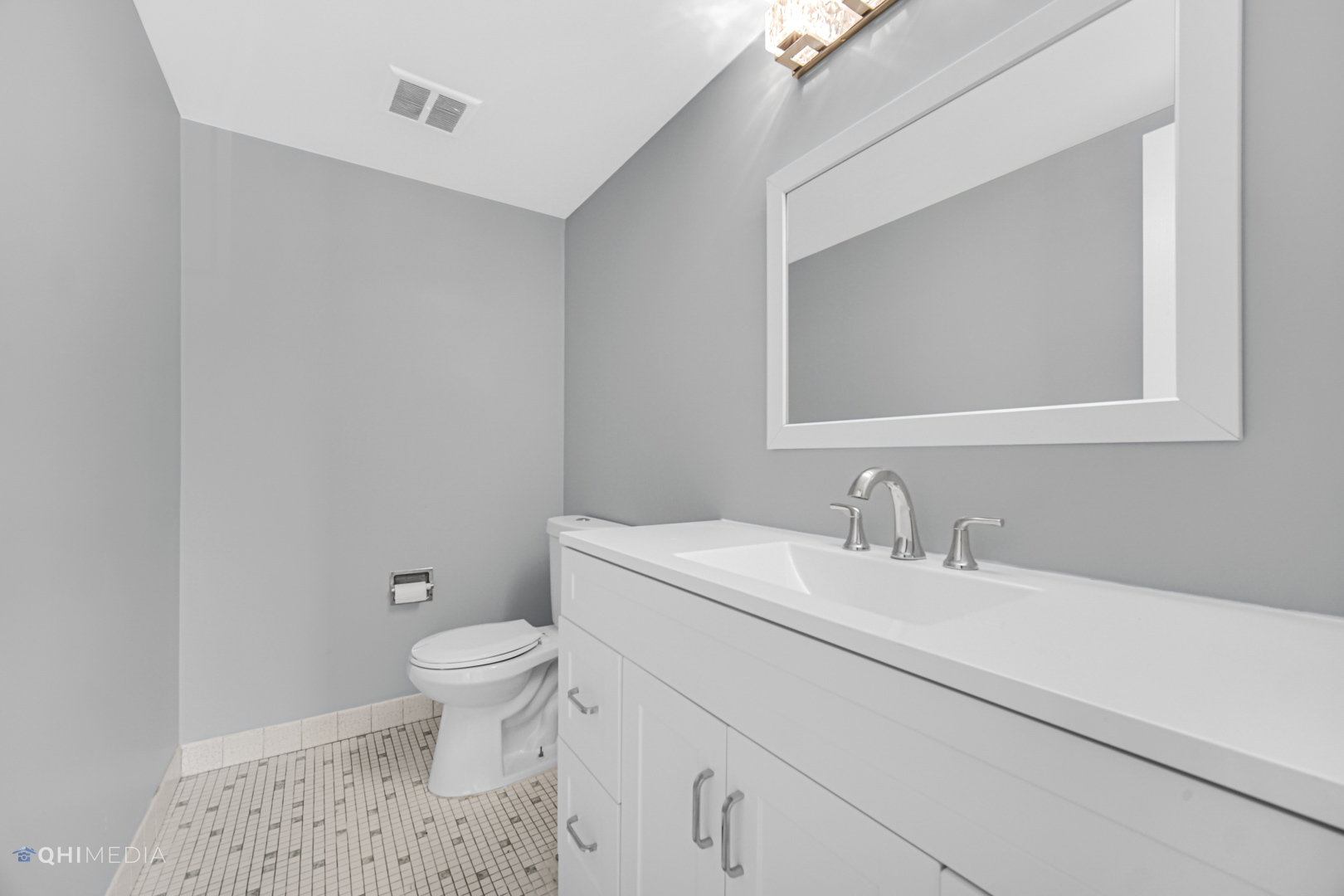 258 East Bailey Road, Unit J Naperville, IL 60565 - Photo 12 of 22 a bathroom with a sink a toilet and a mirror