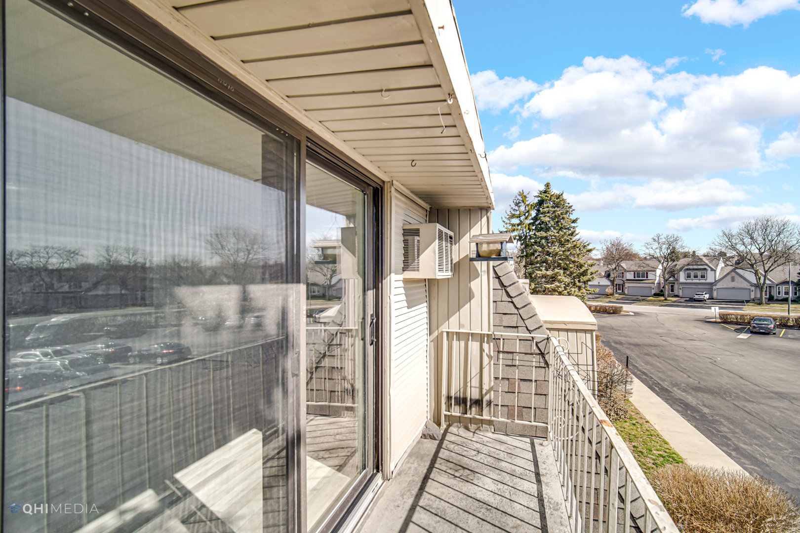 258 East Bailey Road, Unit J Naperville, IL 60565 - Photo 18 of 22 a balcony with view of residential houses
