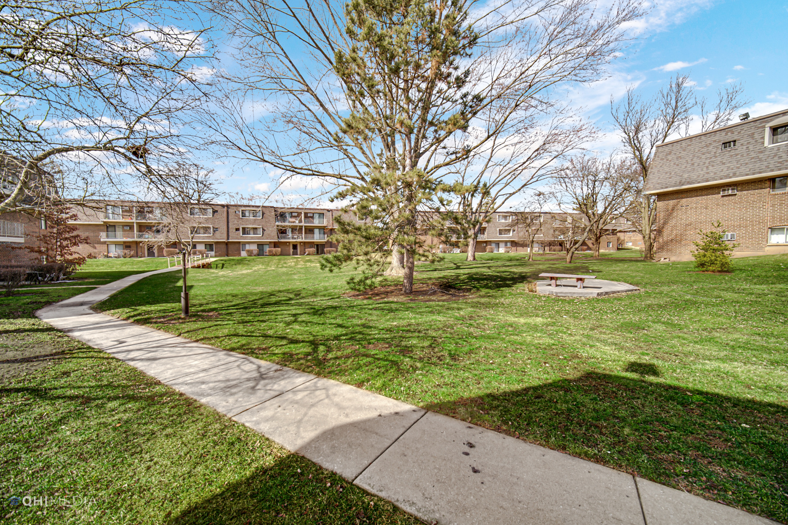 258 East Bailey Road, Unit J Naperville, IL 60565 - Photo 20 of 22 a view of a park with large trees