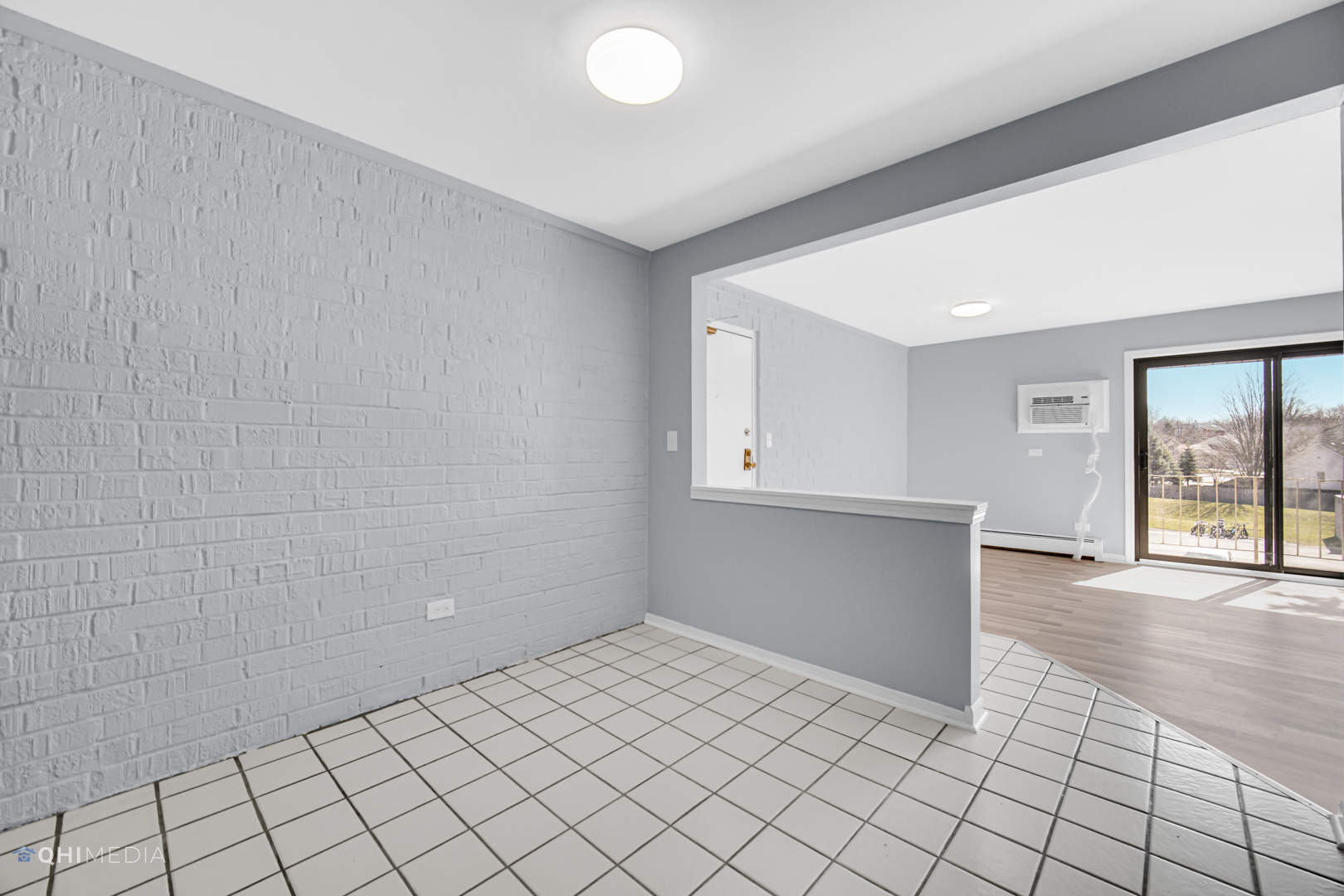 258 East Bailey Road, Unit J Naperville, IL 60565 - Photo 10 of 22 a view of an empty room and window