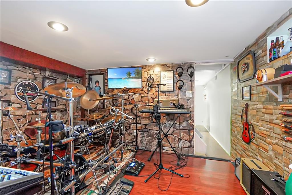 2318 Knapp Street Brooklyn, NY 11229 - Photo 18 of 32 a view of a room with racks on the wall