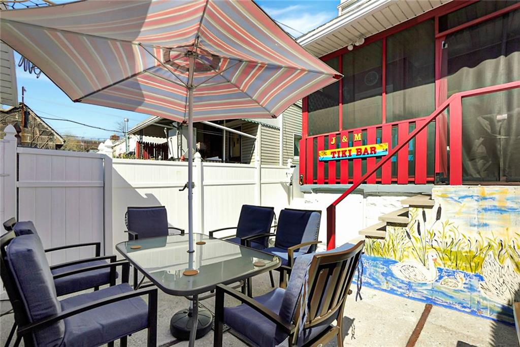 2318 Knapp Street Brooklyn, NY 11229 - Photo 23 of 32 a view of a chairs and table in the patio