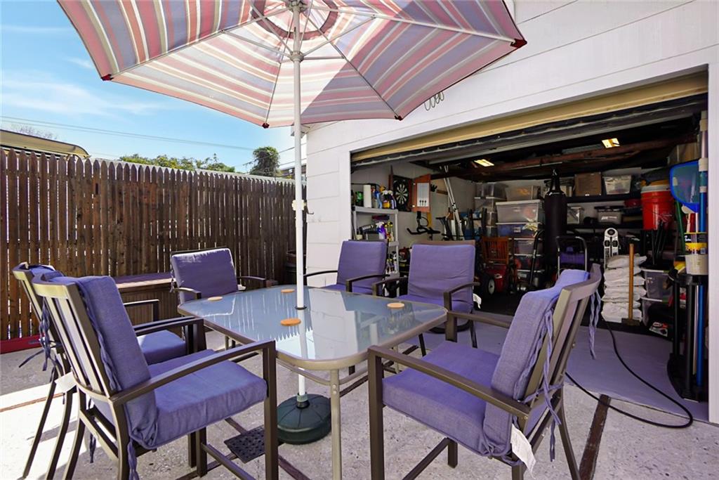 2318 Knapp Street Brooklyn, NY 11229 - Photo 27 of 32 a view of a chairs and tables in patio