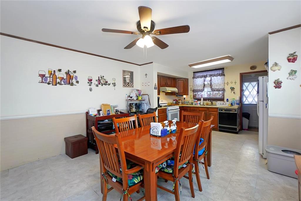 2318 Knapp Street Brooklyn, NY 11229 - Photo 7 of 32 a dining room with furniture and window