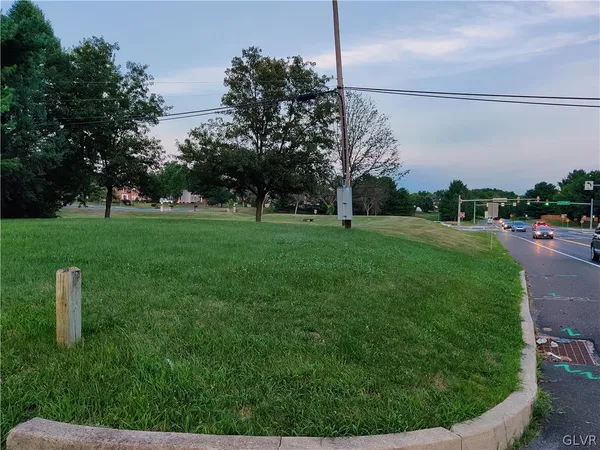 a view of a golf course with a lake
