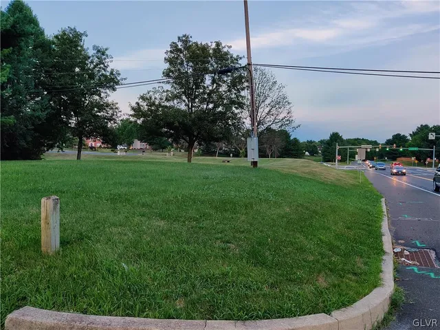 a view of a golf course with a lake