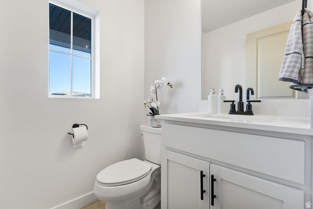 3473 Hardman Way Lehi, UT 84048 - Photo 19 of 22 Bathroom with baseboards and vanity