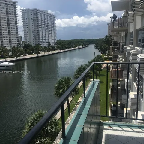 a view of a city and lake