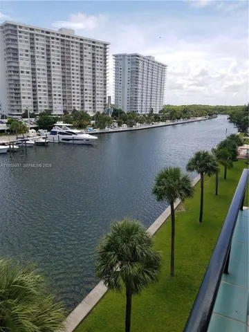 a view of lake with city