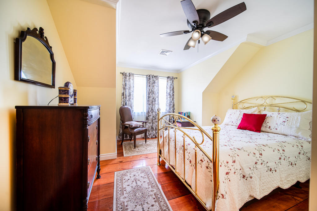 527 County Road Pocasset, MA 02559 - Photo 11 of 25 a bedroom with furniture and a window