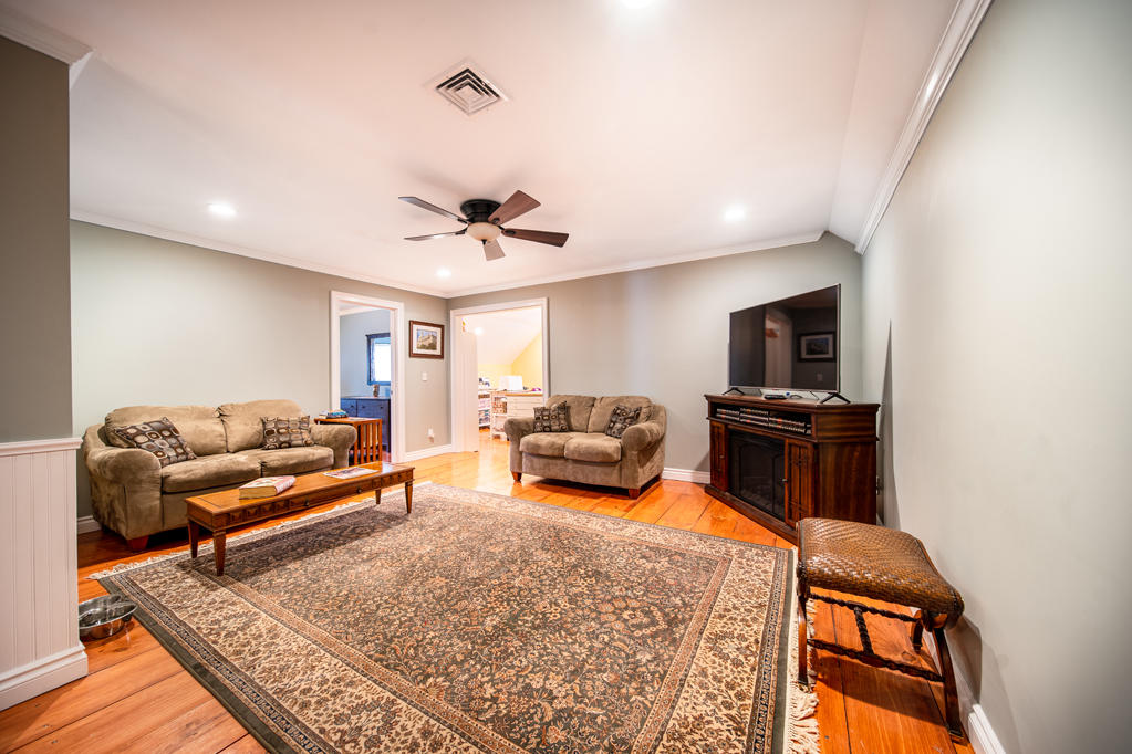 527 County Road Pocasset, MA 02559 - Photo 15 of 25 a living room with furniture and a flat screen tv