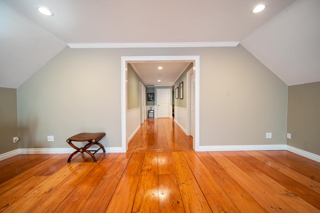 527 County Road Pocasset, MA 02559 - Photo 20 of 25 a view of a room with wooden floor and lounge chair