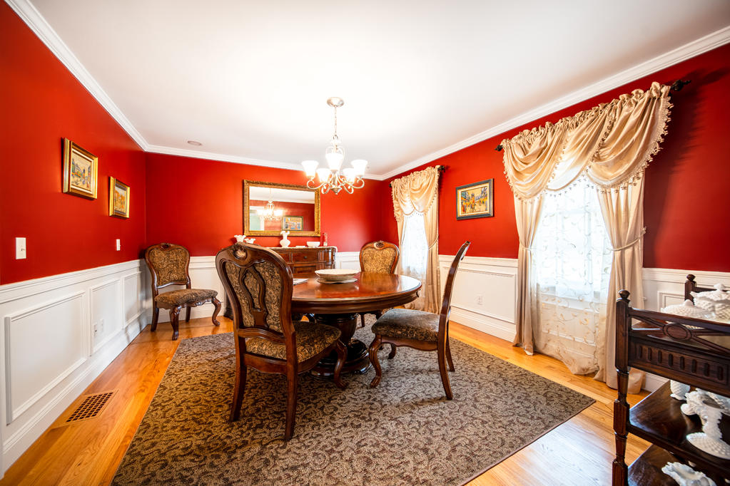 527 County Road Pocasset, MA 02559 - Photo 6 of 25 a view of a dining room with furniture window and wooden floor