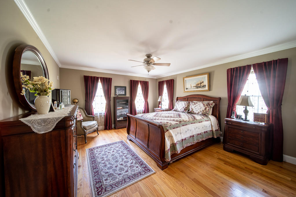 527 County Road Pocasset, MA 02559 - Photo 9 of 25 a bedroom with a bed and window