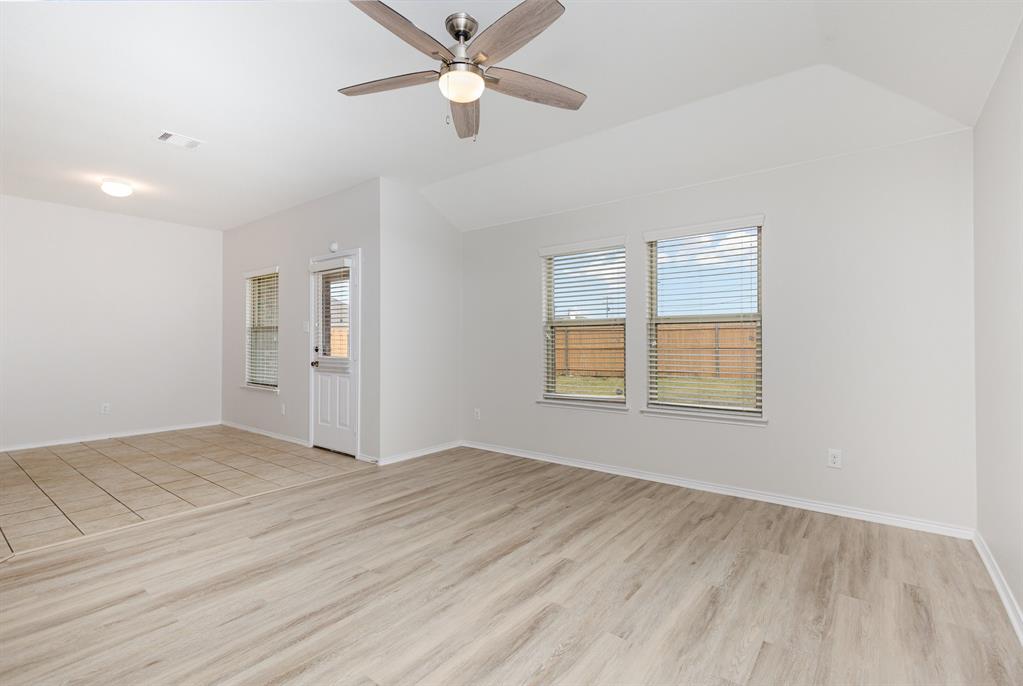 1025 Bend Court Forney, TX 75126 - Photo 2 of 12 a view of an empty room with a window
