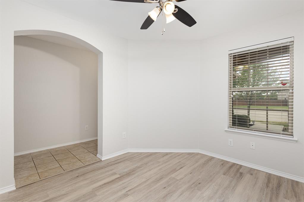 1025 Bend Court Forney, TX 75126 - Photo 7 of 12 an empty room with a window