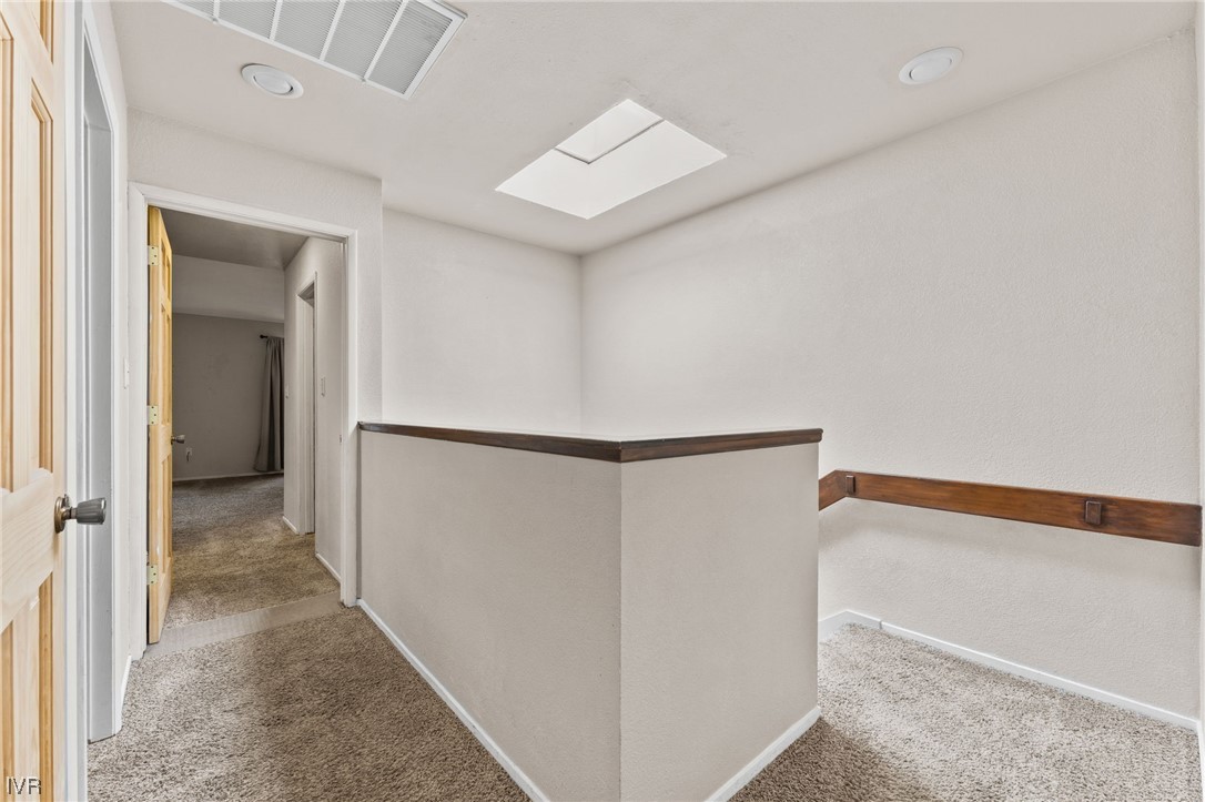 4185 Baker Lane, Unit 4185 Reno, NV 89509 - Photo 16 of 30 a view of a hallway with closet and entryway