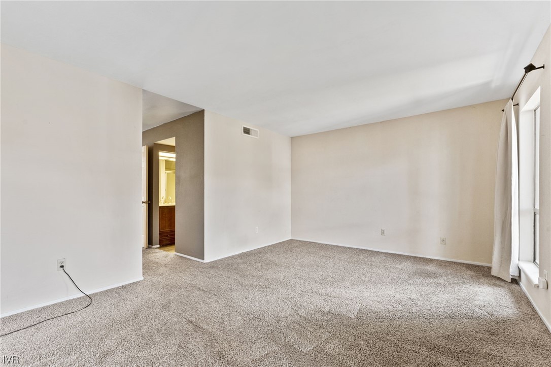 4185 Baker Lane, Unit 4185 Reno, NV 89509 - Photo 18 of 30 a view of an empty room with a window