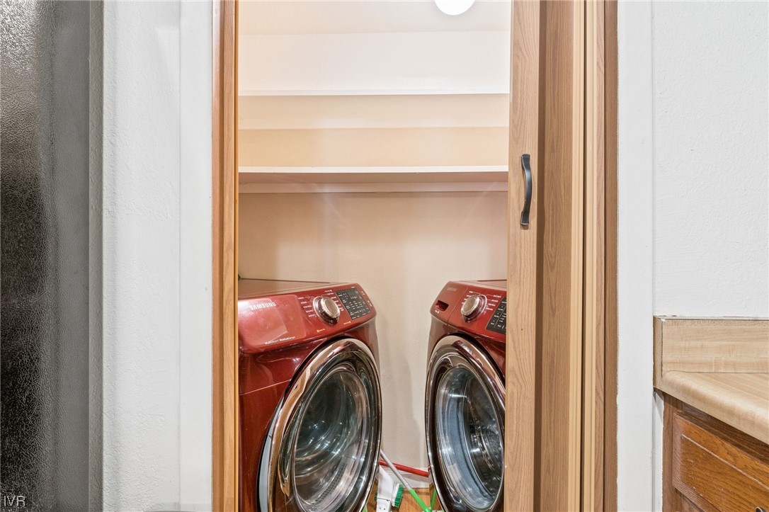 4185 Baker Lane, Unit 4185 Reno, NV 89509 - Photo 26 of 30 a view of storage and utility room with washer and dryer