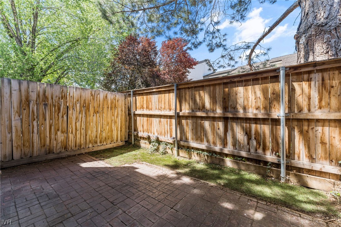 4185 Baker Lane, Unit 4185 Reno, NV 89509 - Photo 27 of 30 a view of backyard with wooden fence