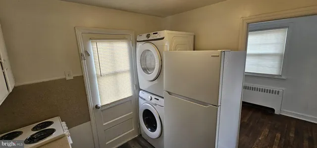 a utility room with dryer and washer