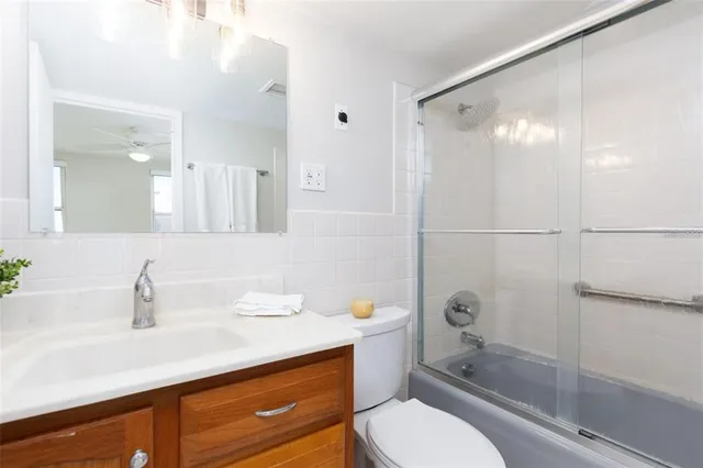 a view of a swimming pool with a patio and a garden