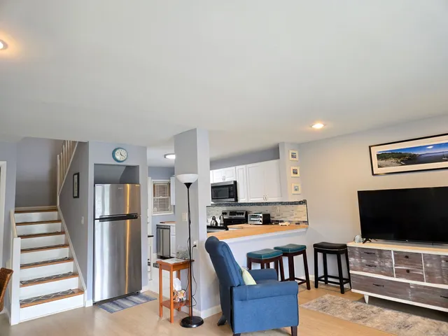 a view of a bedroom with walk in closet and bedroom